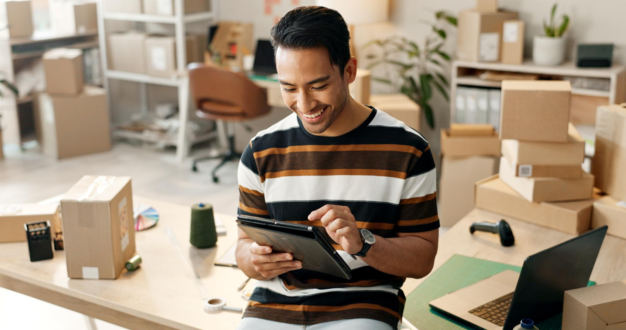 Small business man and boxes with tablet for e commerce and startup inventory